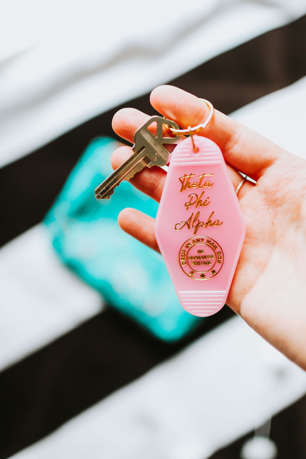 Theta Phi Alpha Motel Keychain